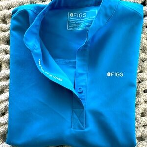 Women’s FIGs extreme blue Rafaela in a XXS